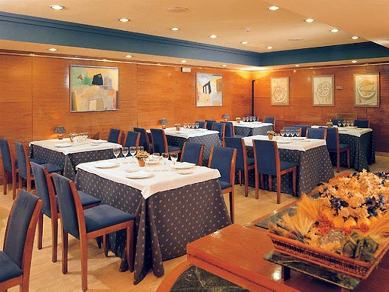 فندق إن إتش برشلونة إيكزامبل المطعم الصورة